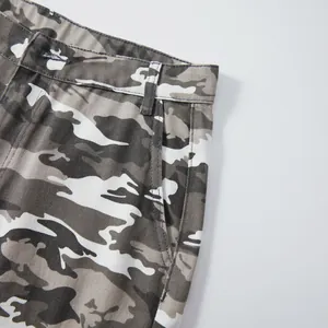 Close-up of men's grey camouflage cargo shorts showing waist and pocket details