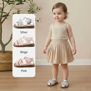 Sweet baby girl lace hollow-out sandals with soft soles in silver, beige, and pink