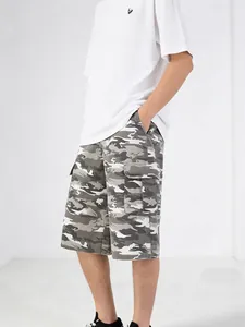 Stylish men's grey camouflage cargo shorts with side pockets for a casual summer look.