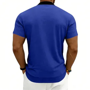 Rear view detail of a men's royal blue athletic short-sleeve shirt with black stand collar