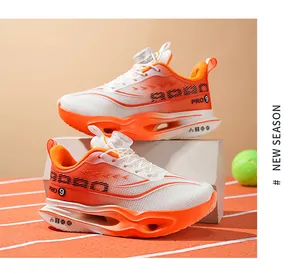 Levendige oranje en witte heren hardloopschoenen met handige draaisluiting systeem