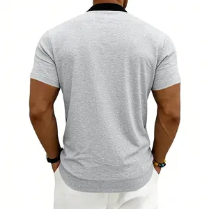 Back view of men's grey short sleeve polo shirt with black stand collar detail.