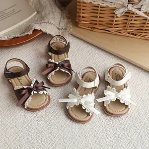Sandales pour Filles Chaussures de Princesse d'Été Décoration Nœud Dentelle Semelle Plate Souple Chaussures de Plage Cuir PU
