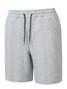 Detailansicht der Herren-Freizeitshorts mit grauem Jacquard-Muster und Kordelzug.