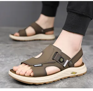 Close-up view of lightweight brown men's outdoor sandals with soft beige comfort soles