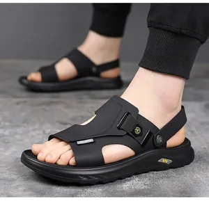 Close-up of men's black sports beach sandals with adjustable straps and soft sole