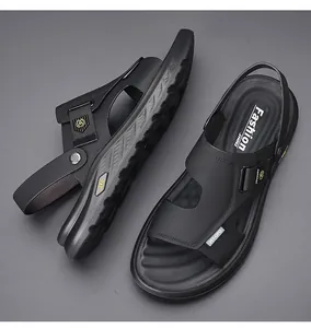 Detailed macro shot of men's black dual-use outdoor sandals featuring a textured soft sole.