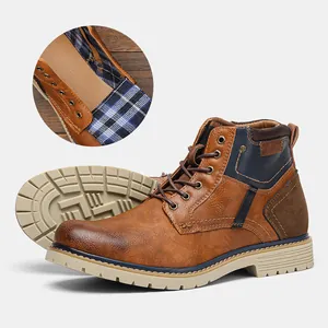 Retro brown leather ankle boots for men showing details of sole and the plaid lining