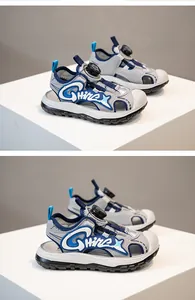 Close-up detail of boys' athletic closed-toe sandals with rotary dial lacing system
