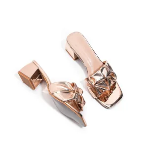 Elegant rose gold metallic square toe block heel sandals with decorative bow detail