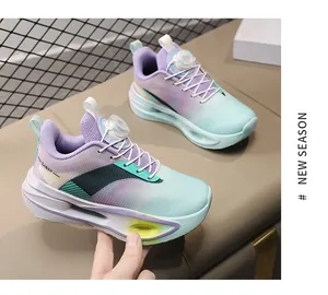 Scarpe da corsa traspiranti da ragazzo con sfumatura viola-menta e sistema di chiusura BOA.