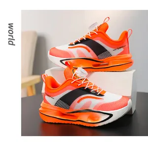 Scarpe sportive arancioni per ragazzi in rete traspirante con sistema a rotella