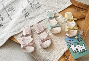 Stylish girls' bowknot sandals in various colors with floral insoles for summer fashion.