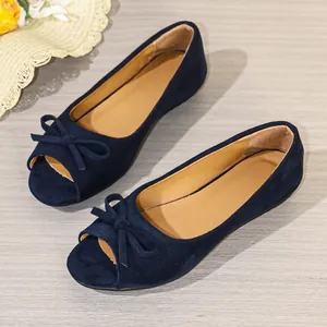 Elegant navy blue suede-like peep-toe flat shoes featuring a stylish bow detail