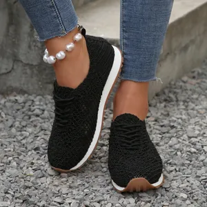 Stylish women's breathable black mesh lace-up sneakers perfect for casual walking outdoors