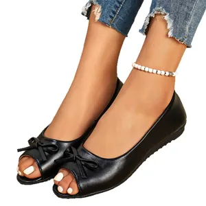 Elegant black women's flat shoes featuring a stylish bow and peep-toe design in French style