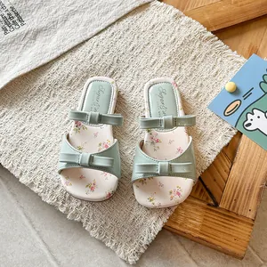 Elegant mint green girls' sandals with bow decoration and cute floral print insoles