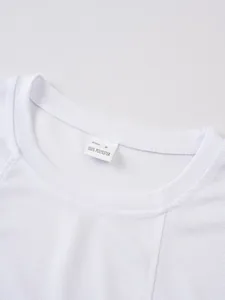 Detailed close-up view of white breathable mesh tank top neckline with 100% polyester tag