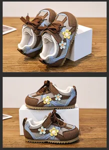 Close-up view of breathable mesh kids' running shoes with cute floral embroidery details