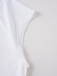 Macro detail showing the breathable white mesh fabric of this sporty men's tank top
