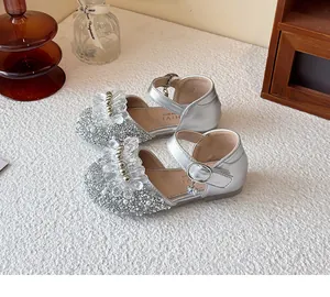 Elegant silver girls' princess shoes featuring sparkling rhinestones and crystal flower details