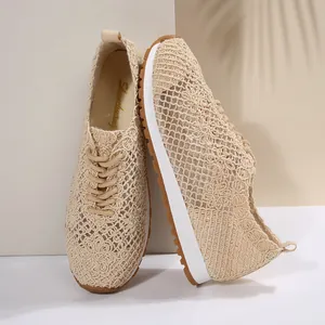 Close-up of women's beige floral crochet mesh breathable lightweight casual sneakers