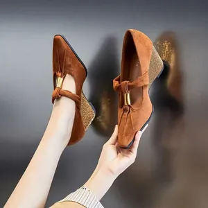 Vintage brown suede Mary Jane wedge shoes with pointed toe and decorative gold buckle