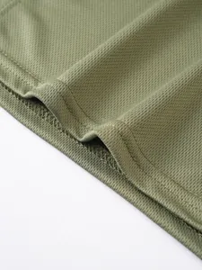 Close-up detail of breathable olive green mesh fabric and stitching on men's tank top