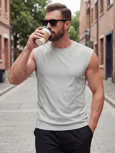 Outdoor lifestyle shot of men's breathable mesh grey sleeveless tank top in casual fit