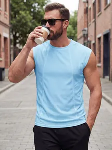 Detailed view of men's breathable light blue mesh tank top in an urban setting