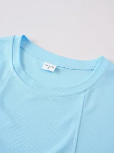 Detail of round neckline and breathable mesh fabric of light blue men's sport vest