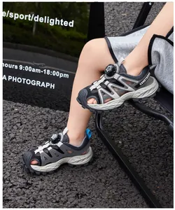 Detailed view of boys' breathable closed-toe sports sandals with a rotary buckle