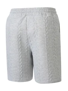 Detailansicht der grauen Jacquard-Strick-Shorts für Herren mit elastischem Bund.
