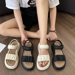 Fashionable girls' summer beach sandals featuring stylish pleated straps and soft thick soles.