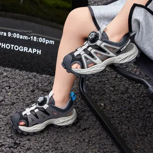 Boys' breathable closed-toe sports sandals with rotating buckle closure in grey