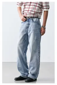 Full view of light blue loose straight-leg denim jeans in a minimalist cleanfit style