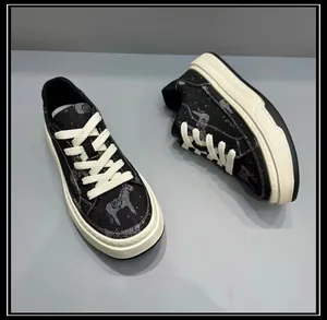 Side view detail of black denim patterned thick sole men's casual chunky sneakers