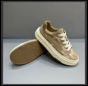 Detail of men's thick-sole canvas sneakers showing both the side profile and star-patterned sole
