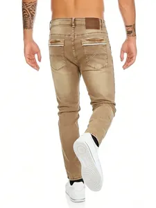 Rear view of classic brown men's stretch straight denim jeans showing back pocket details