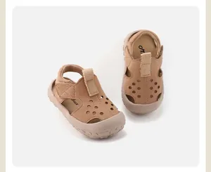 Detailed macro view of toddler breathable leather sandals with soft non-slip soles