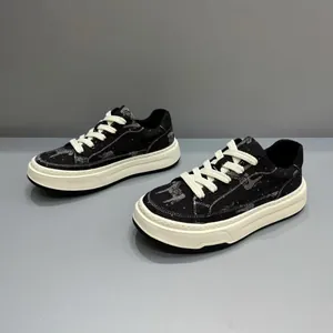 Stylish men's black canvas platform sneakers with thick white soles and breathable soft design.