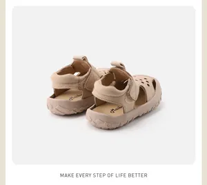 Close-up rear view of breathable beige toddler sandals featuring non-slip soft rubber soles.