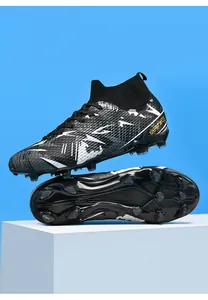 Professional high-top soccer cleats with firm ground studs and textured upper