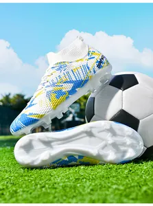 Detailed view of the spike configuration and high-top sock fit on the soccer cleats
