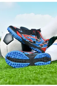 Professionele voetbalschoenen voor kinderen met blauwe TF-zool en klittenbandsluiting