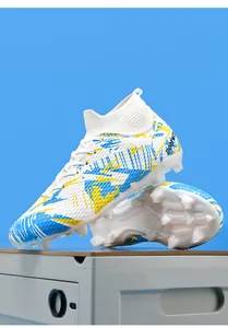 Professional high-top soccer cleats with firm ground studs and blue-yellow graffiti pattern