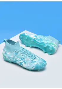 Professional light blue high-top soccer cleats with firm ground studs and camo pattern