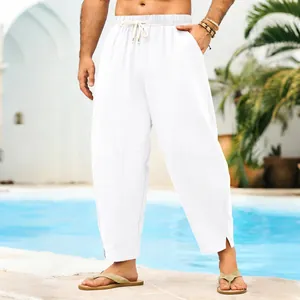 Detail of white linen harem pants with drawstring at a poolside resort