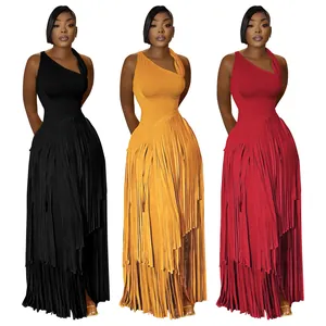 Detail of elegant one-shoulder maxi dresses with layered fringe skirts in multiple colors