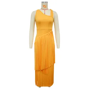 Detailed view of an elegant yellow one-shoulder dress with tiered long fringe layers